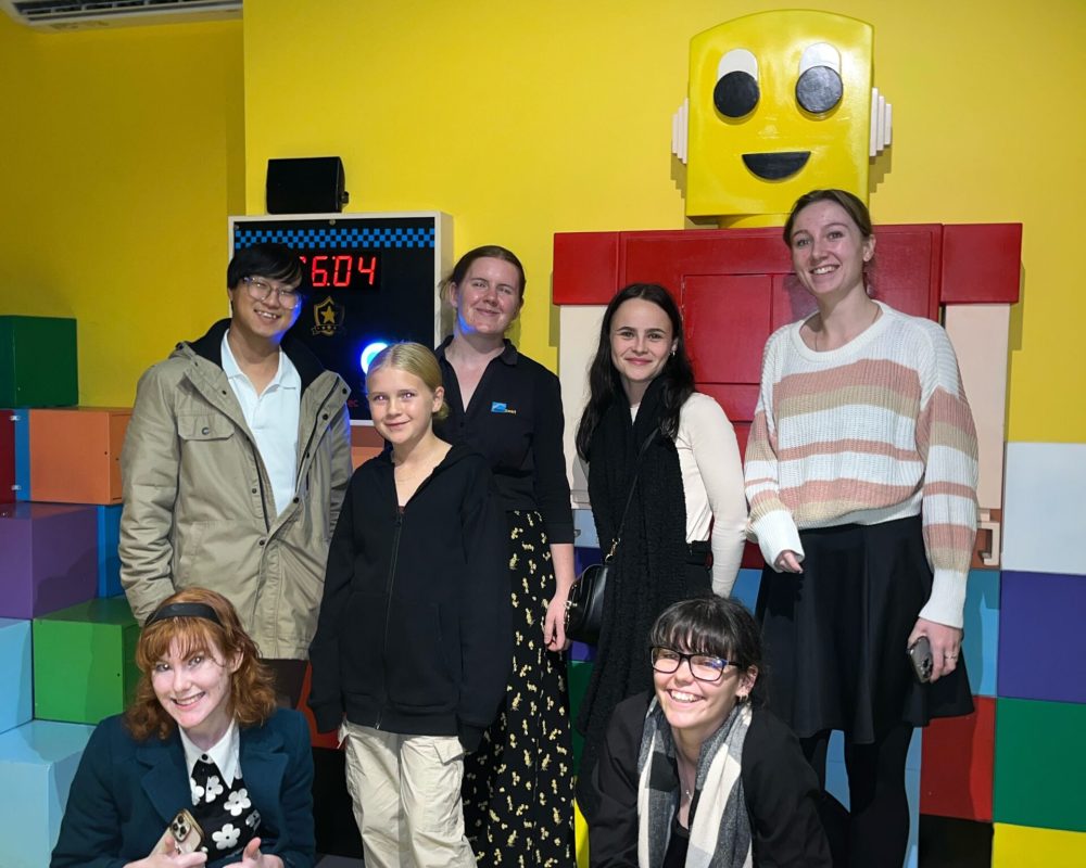 group of people on escape room part of corporate event